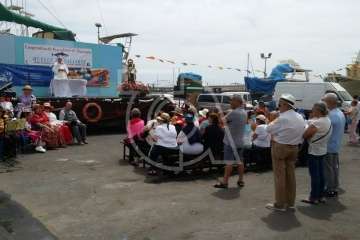 Procesión terrestre-marítimo de la Virgen del Carmen por la bahía de Melenara (Foto TA)